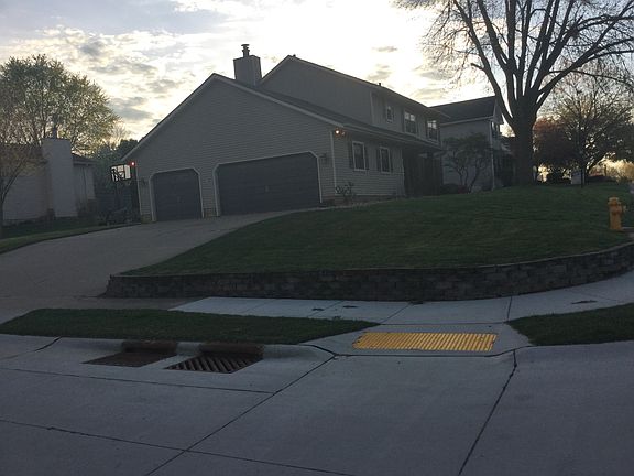 Three car garage on corner l