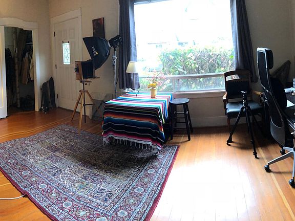 Living shown with previous tenant furniture