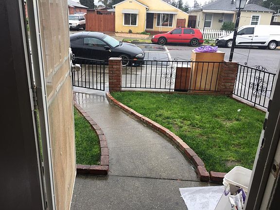 View of lawn from the front door of apartment