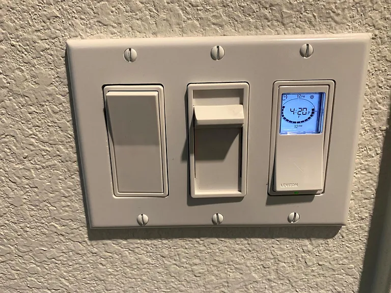 Leviton Timer switches - to switch the lights based on the timer... Home has 2 of these for Outdoor lights