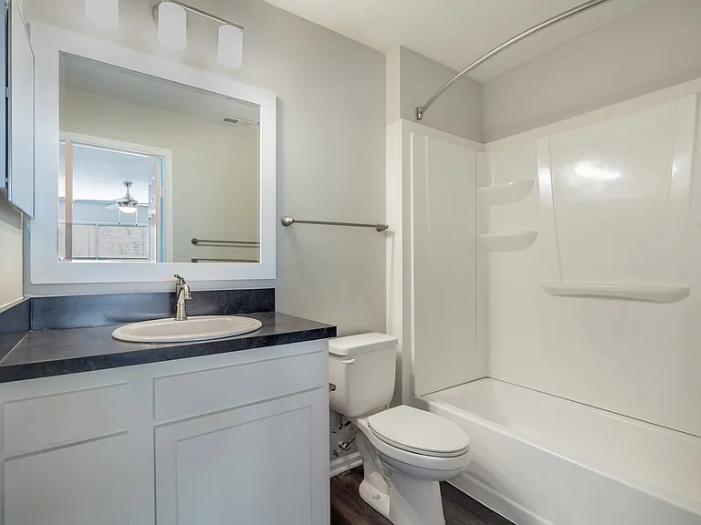 A Glenmount Deluxe bathroom showcasing clean, contemporary finishes.