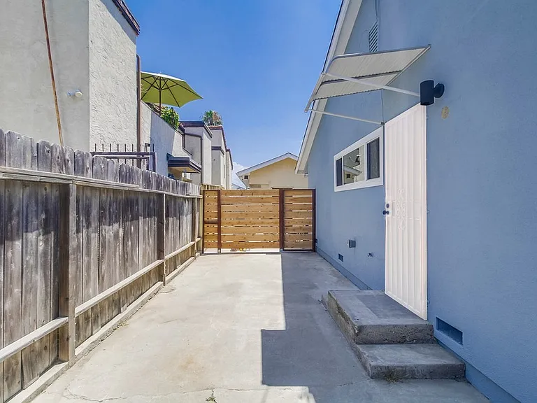 Gated, Private Yard & Two Tandem Parking Spots