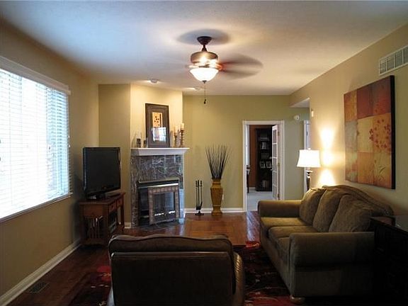 Great Room: Great Room looking toward Fireplace & Glass Door to Home Office.