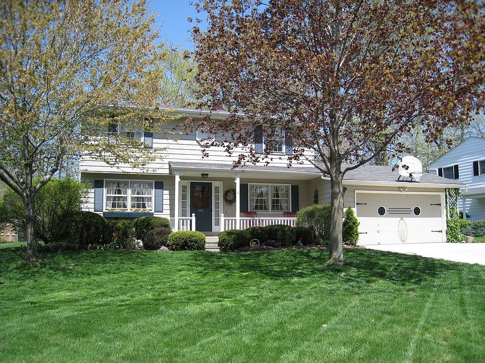 Cozy front porch, updated driveway