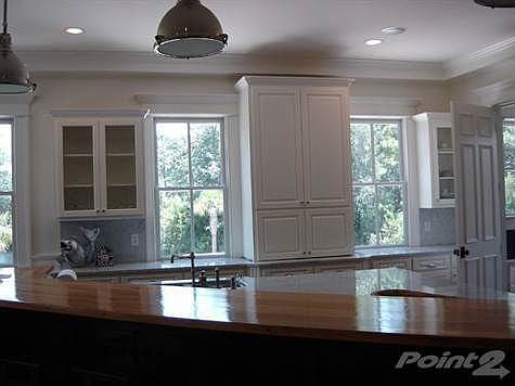 Large Kitchen with Marble Counters