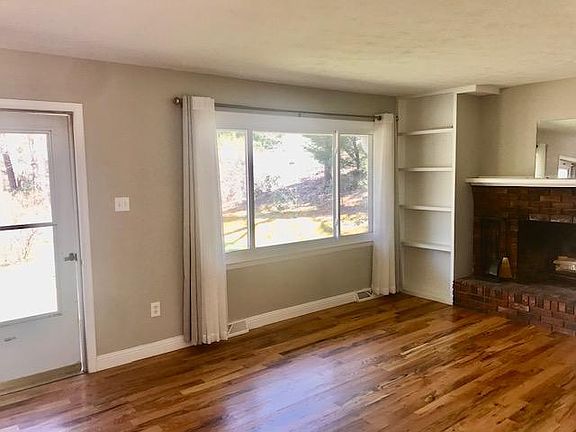 The fireplace has been updated to white wash. Decorative use only.