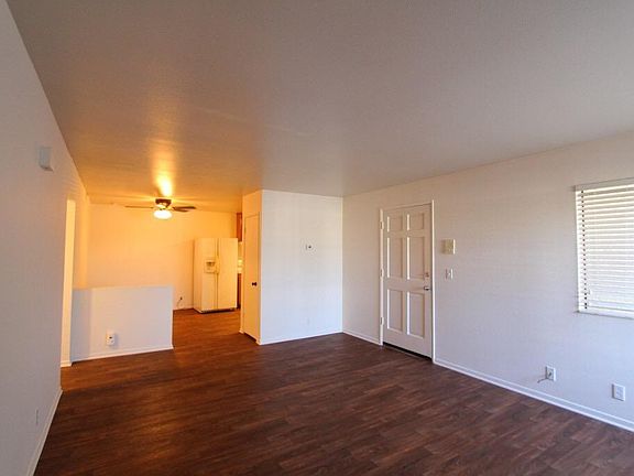 View from living room into kitchen & dining room