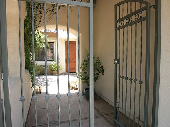 gated front entrance to home
