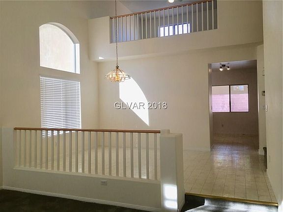 Your first view from the front door.  As you stand in the entry/living room, look up to Dining Room, see the loft overlooking, s