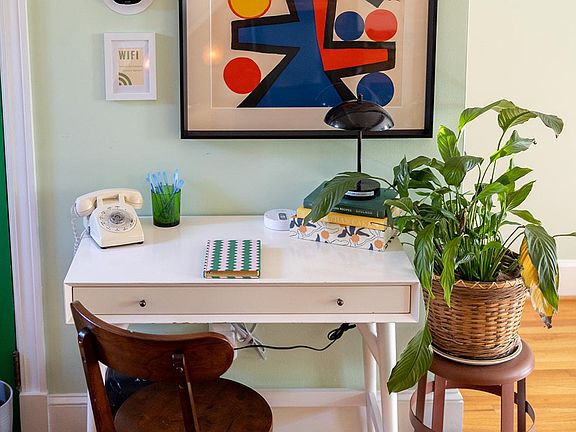 __ A beautiful blend of art and function sets the stage for work or contemplation. _____