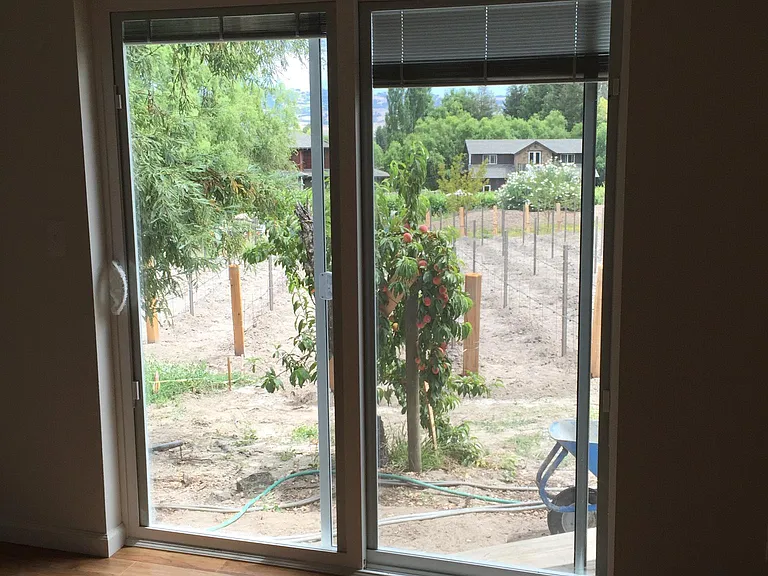 Door to private patio. Yard is fenced in.