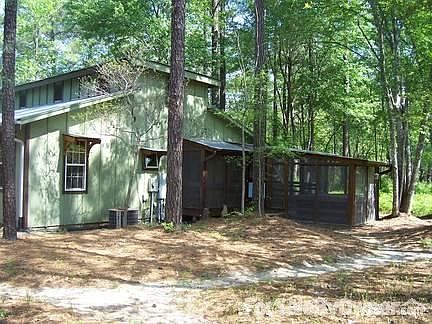 southeast back corner from shed
						:
						jacuzzi hot tub inside porch