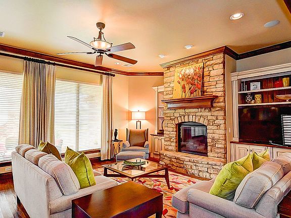 Cozy fireplace & built-ins.