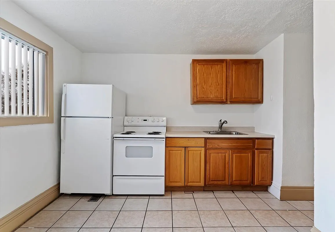 2557 Adams Ave - 2 — Photo 3
