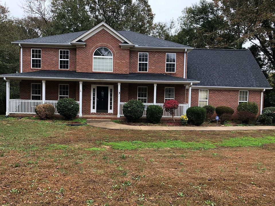 Front view, large backyard with no homes behind