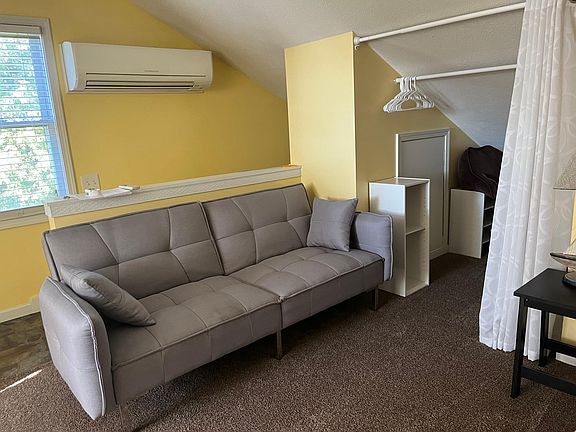 Couch and closet area