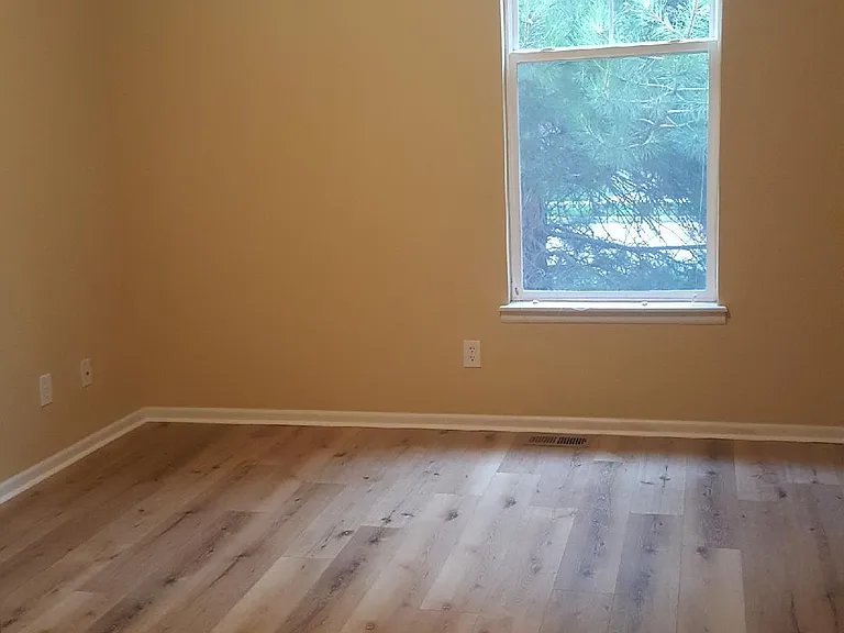 Second bedroom with new manufactured flooring! Clean, sharp! Roomy