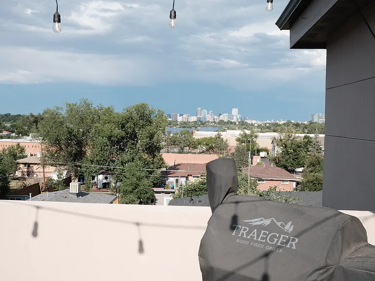 Rooftop deck with unobstructed views of sloans lake and the city