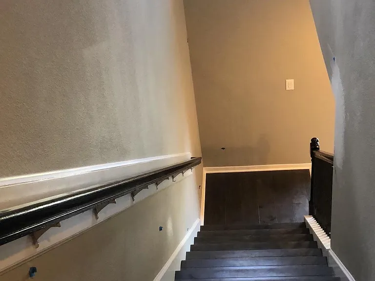 View from second floor looking down stairs