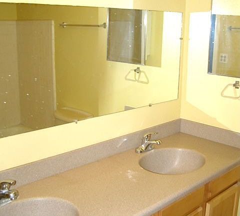 New cabinet and corian countertops in main bathroom