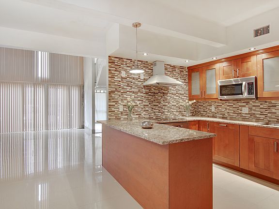 5th image of 741 E Coco Plum Cir APT 4