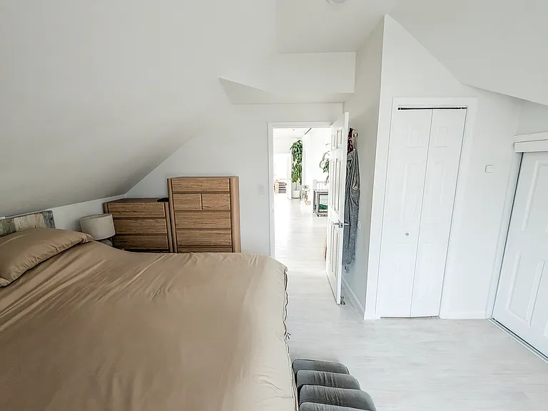 Master bedroom view into living room