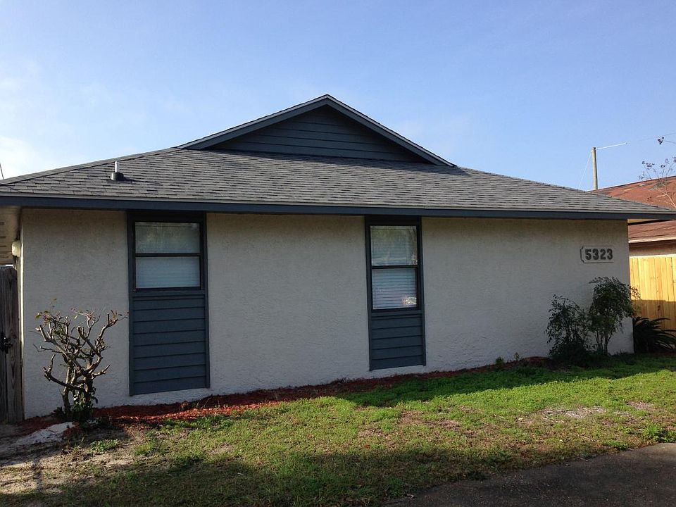 View of duplex from the street (north side of house)