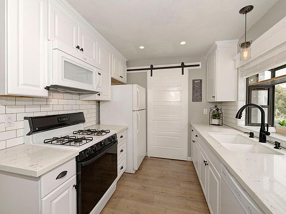 Quartz Countertops, Tile Backsplash, & New Appliances