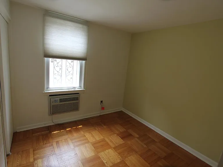 Master bedroom window with window treatment