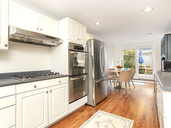 Spacious Eat-in Kitchen w/French Doors Leading to an Expansive Deck