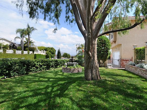 Front yard with fountain