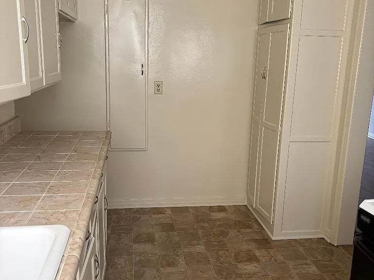 Kitchen with lots of cabinets and pantry