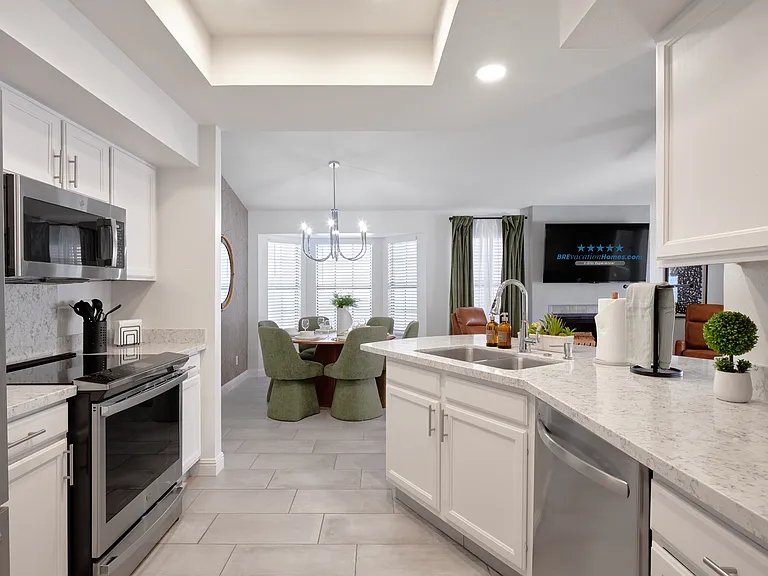Kitchen opens to 2 dining areas