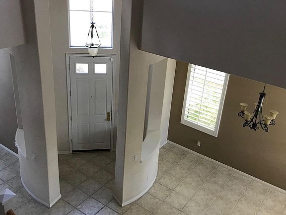 Entry with high ceilings.  Tile throughout main floor