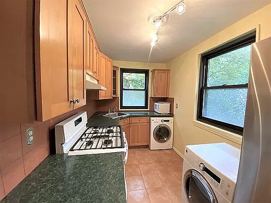 5th image of 245-14 61st Ave #2