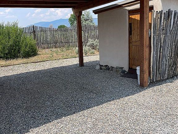 small carport with shed