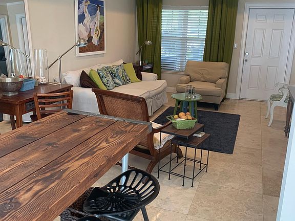 The home's living areas flow together to create open space to enjoy family and friends whether gathered in the living room or kitchen.