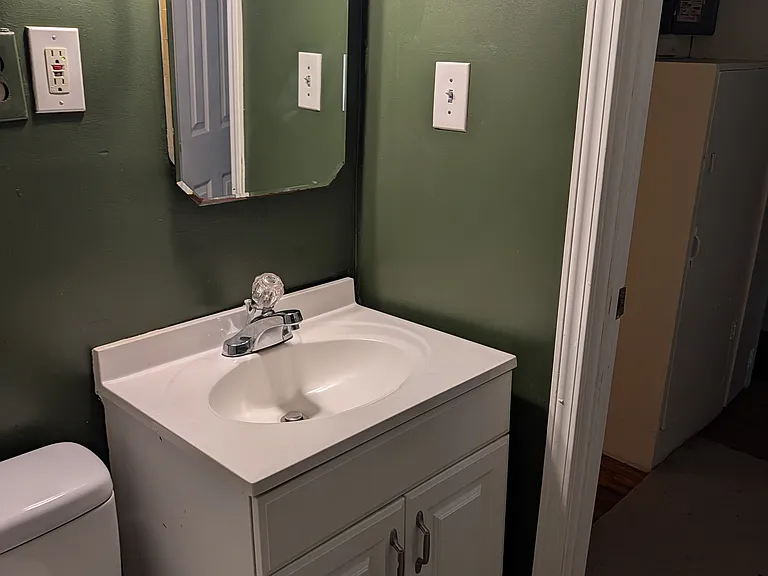 Bathroom with sink and medicine cabinet
