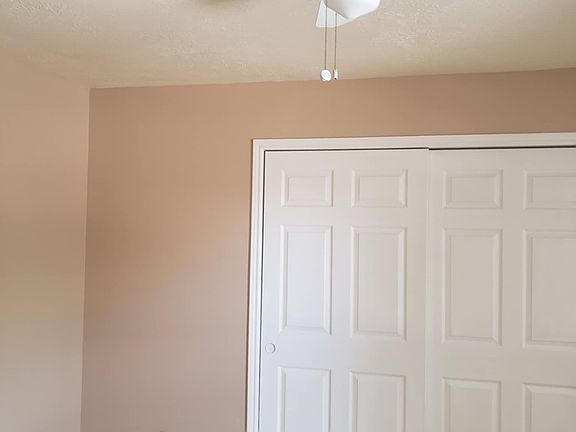 Room 2 - Located in the second floor with multiple windows and spacious closet space