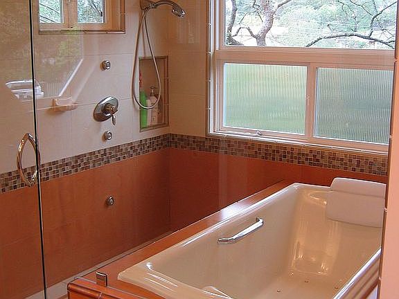 The masterbath with jetted tub and shower.
