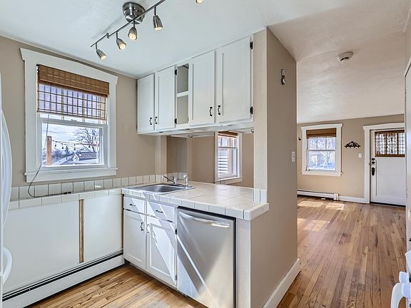 Kitchen with newly installed sink.