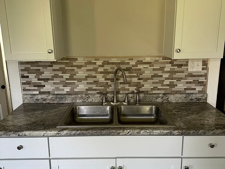 Kitchen sink and cabinets