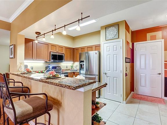 4th image of 10126 Villagio Palms Way Unit 101