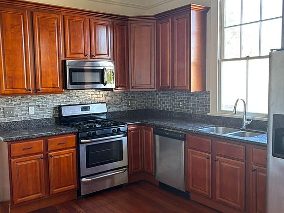 Lovely kitchen, stainless steel appliances, dishwasher, microwave, beautiful cabinets