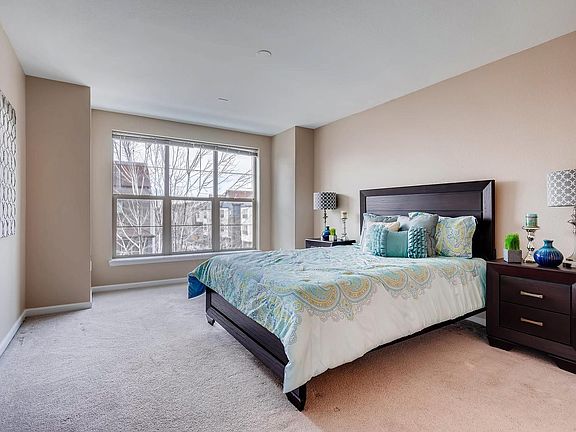 Large, light-filled master bedroom.