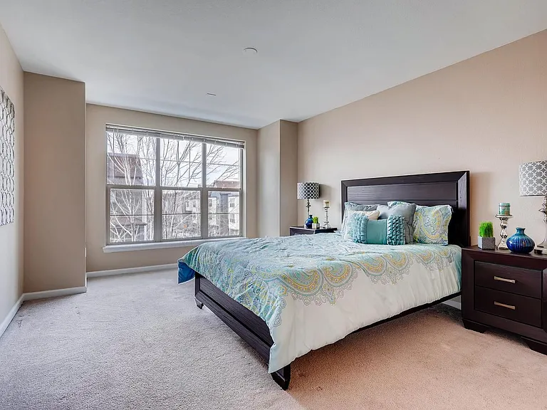 Large, light-filled master bedroom.