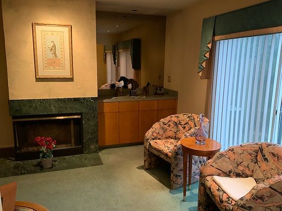 Dry bar and fireplace