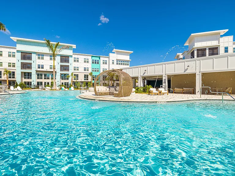 Relaxing Saltwater Pool with Wi-Fi, Sun Shelves, Cabanas & Grill Areas
