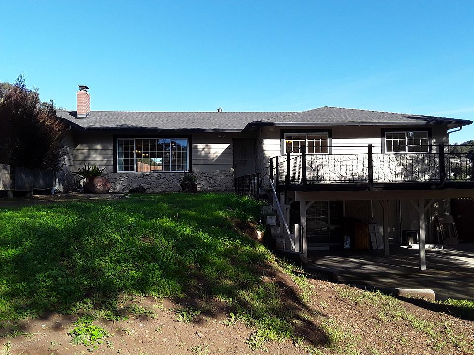 Front of house, with carport