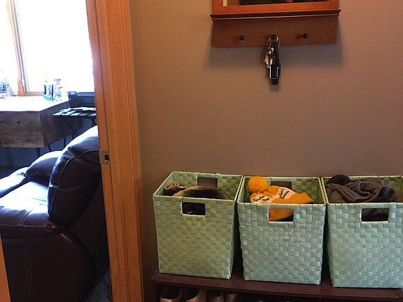 Entry. To the left is bedroom #1, currently being used as an